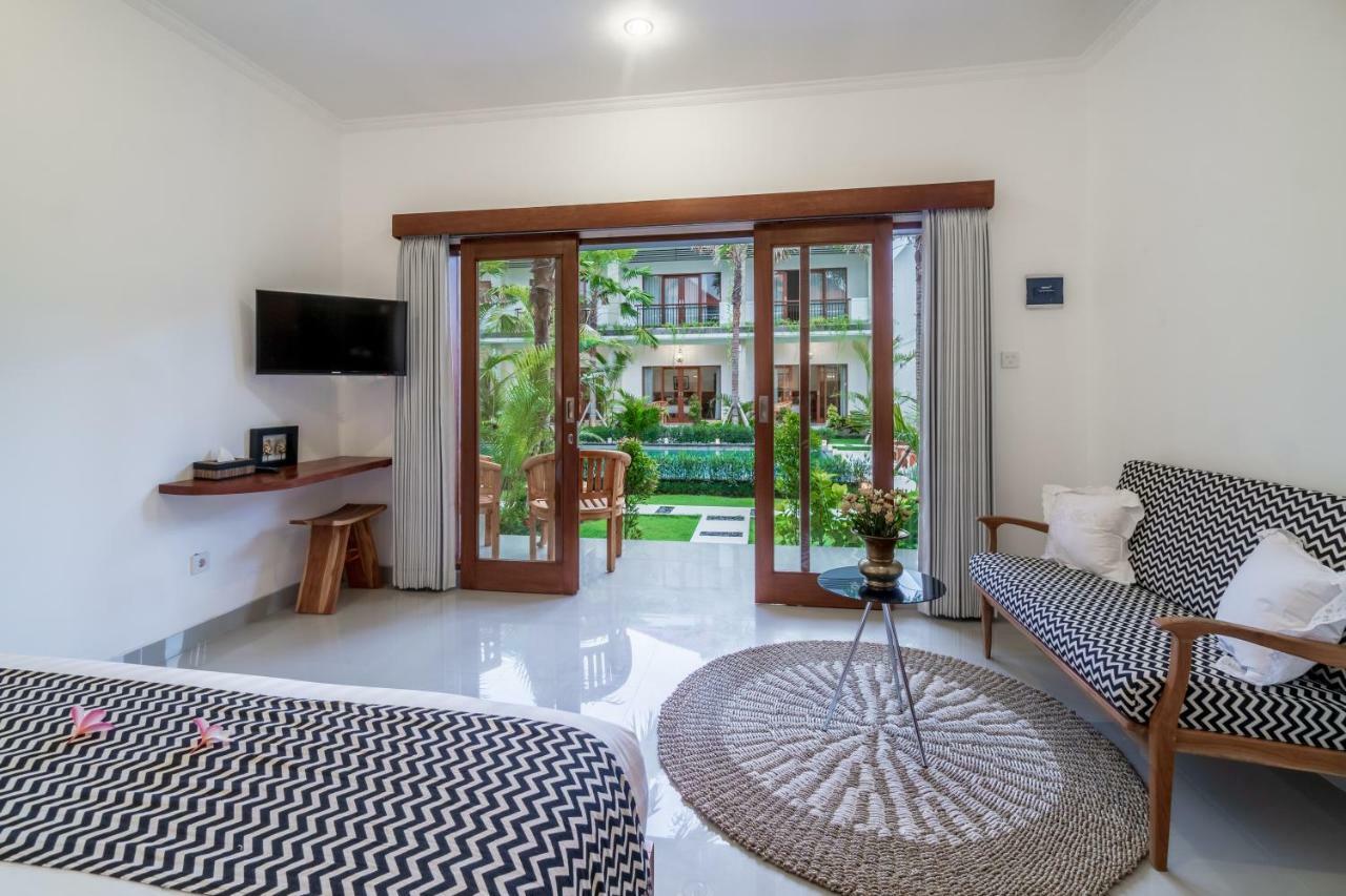 Hotel Puri Uma Ratu By Rpm Seminyak Esterno foto